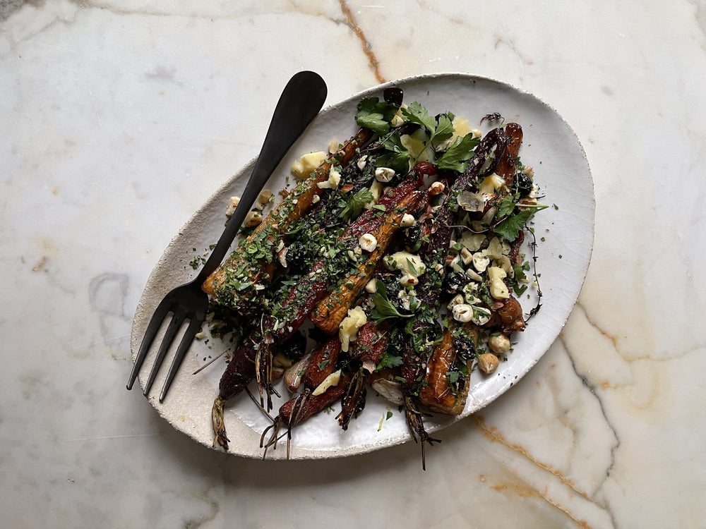 Caramelized Root Vegetables With Lemon, Hazelnuts, and Sharp Cheddar