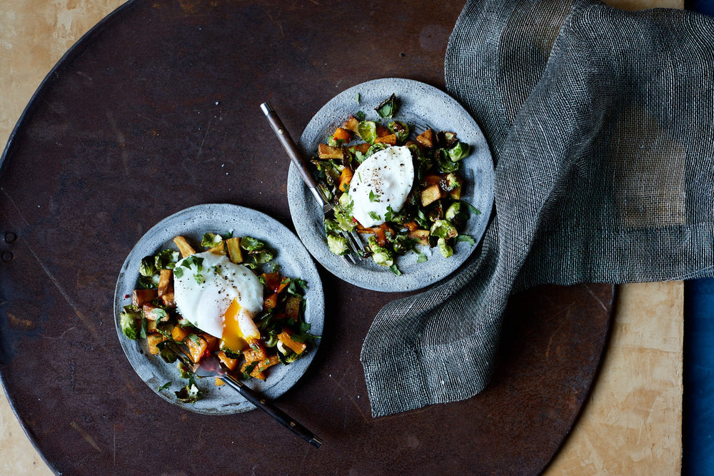 Roasted Pumpkin and Brussels Sprouts Hash With Poached Eggs