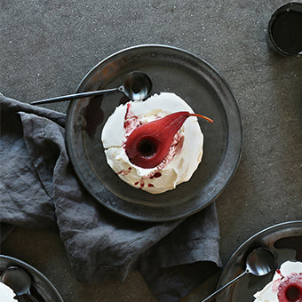 Satsuma and Red Wine Poached Pears Over Vanilla Pavlovas